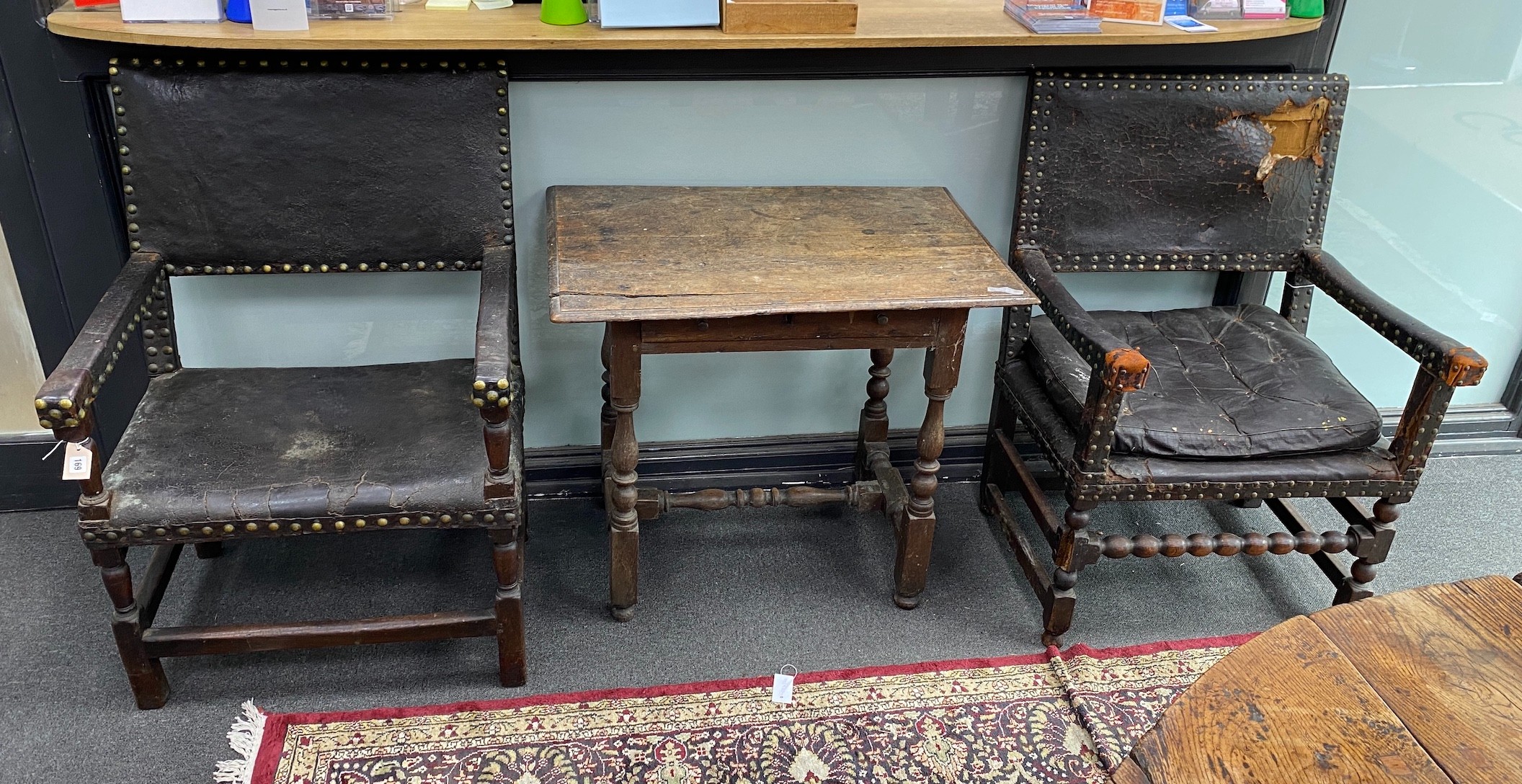 A near pair of 18th century oak and leather dining chairs, larger 69cm, depth 64cm, height 101cm